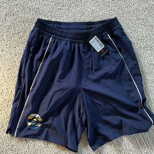 NWT Peloton Output 8" Lined Piped Turin Short